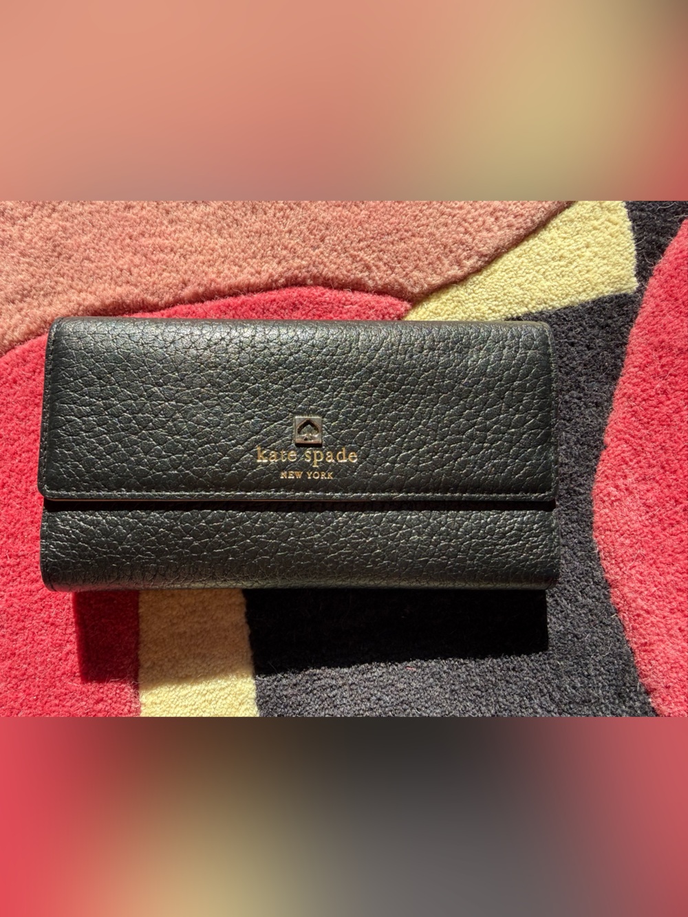 kate spade Black Pebbled Leather Continental Wallet with Gold Logo